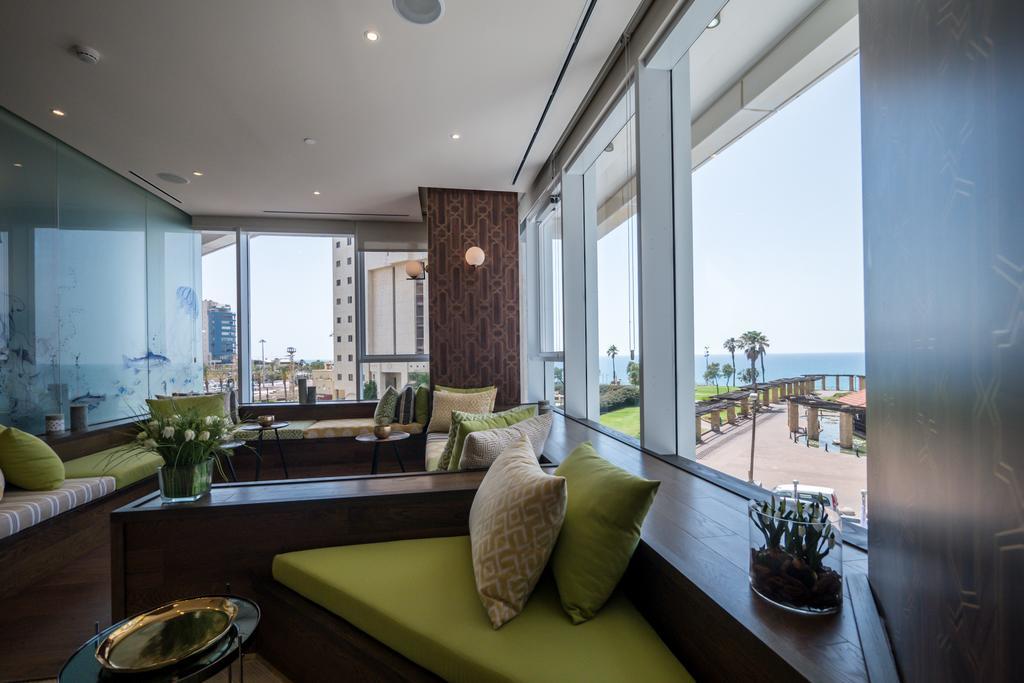 David Tower Hotel Netanya By Prima Hotels - 16 Years Plus Esterno foto The interior of a suite at the InterContinental